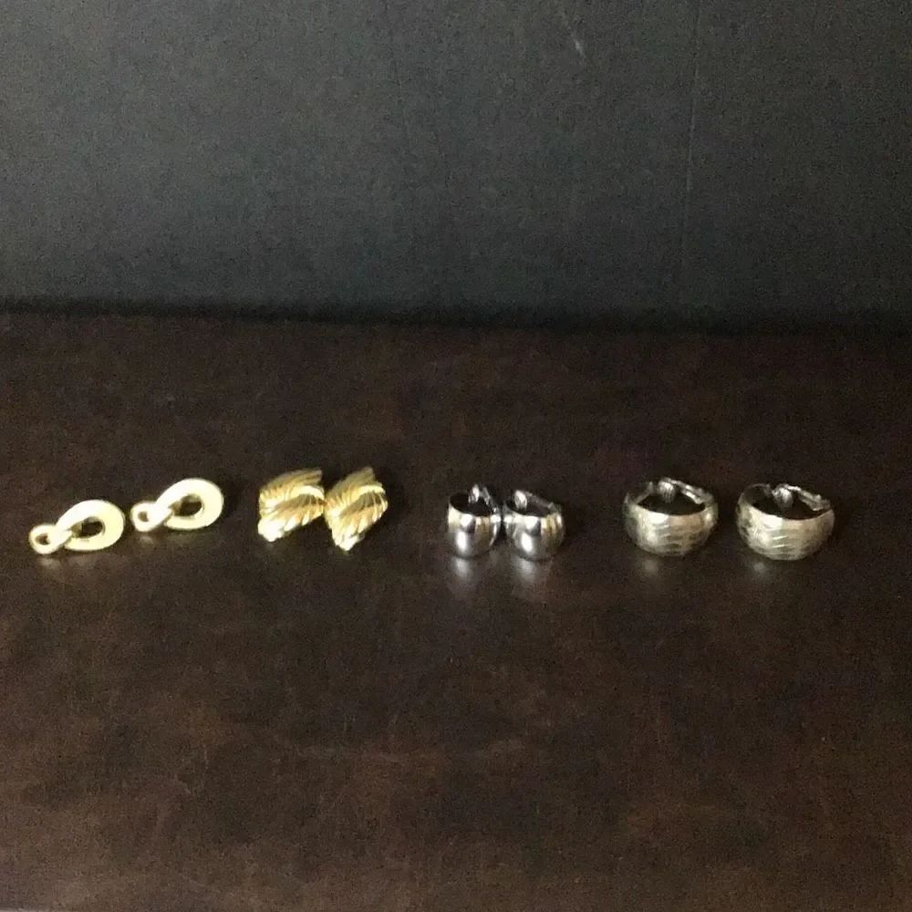 Earrings set of four clip on gold and silver tone